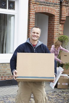 Furniture pick-up service removing a sofa in Brent