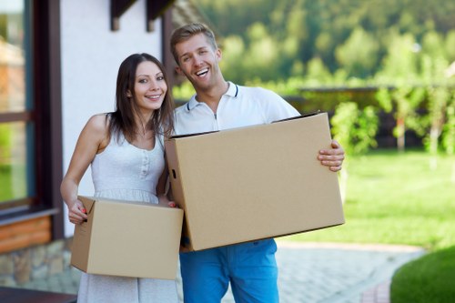 Brent van service handling household moving boxes