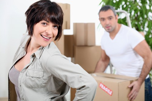 Professional man and van in Brent handling household items