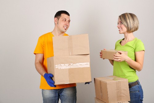 Packed moving boxes and furniture prepared for transport